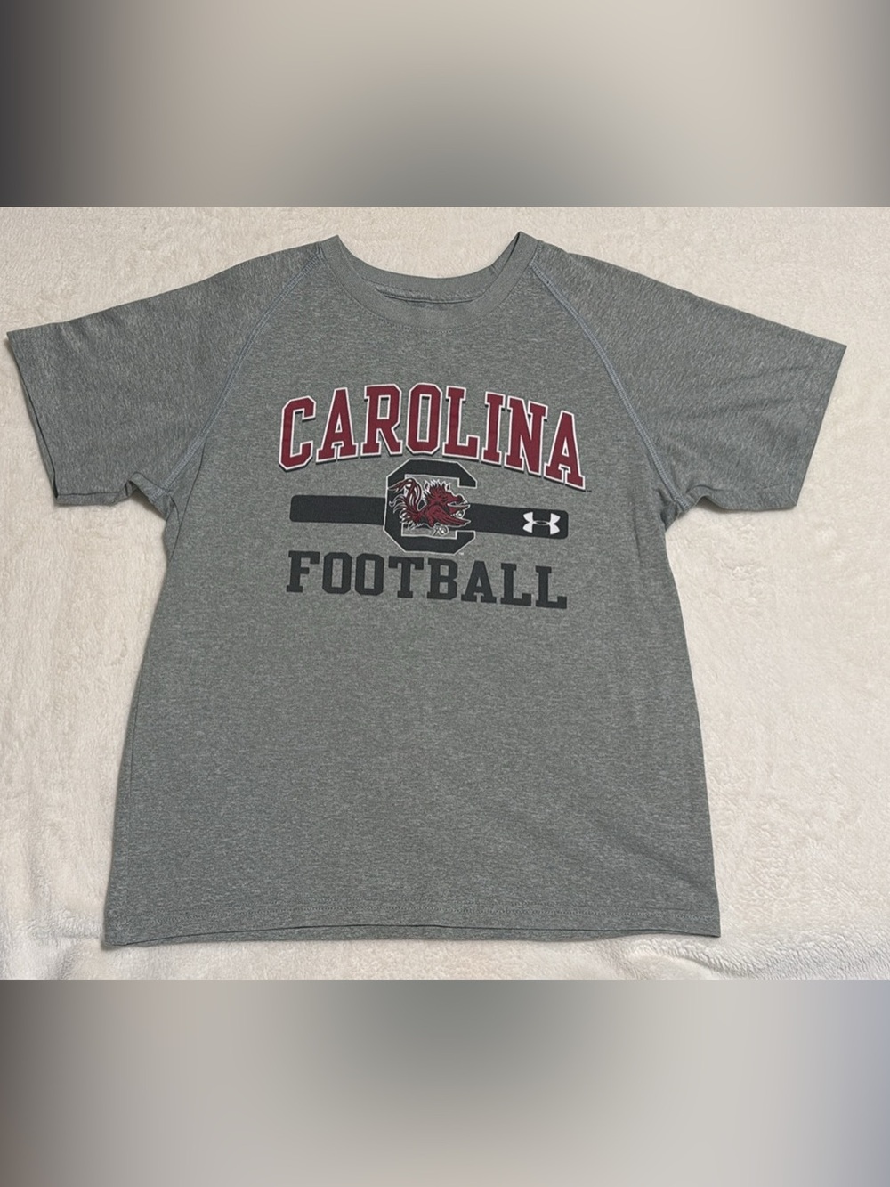 Under Armour youth medium Carolina Football Grey Short Sleeve Tee